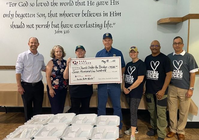 CUB staff and board members receive a grant award